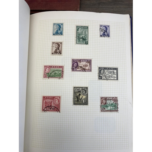 508 - Six stamp albums containing a collection of worldwide stamps