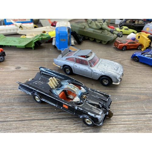 456 - A collection of diecast model vehicles to include Corgi 007 Aston Martin DB5, Corgi Batmobile, Dinky... 