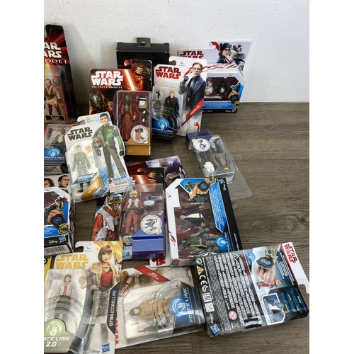 458 - A large collection of boxed and unboxed Star Wars figurines to include Saga Legends Darth Maul, The ... 