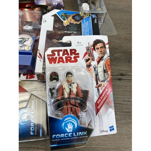 458 - A large collection of boxed and unboxed Star Wars figurines to include Saga Legends Darth Maul, The ... 