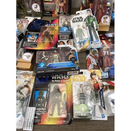 458 - A large collection of boxed and unboxed Star Wars figurines to include Saga Legends Darth Maul, The ... 