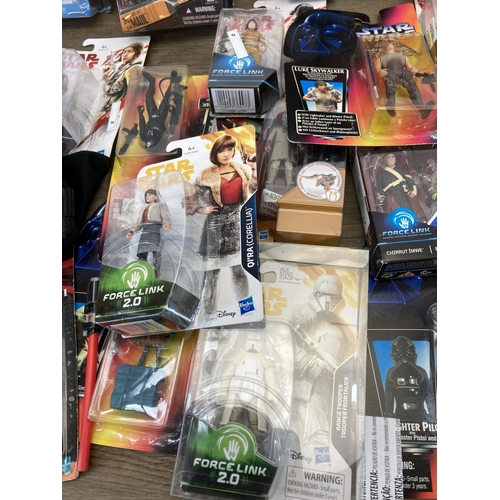 458 - A large collection of boxed and unboxed Star Wars figurines to include Saga Legends Darth Maul, The ... 