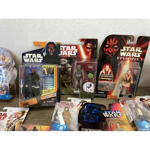 458 - A large collection of boxed and unboxed Star Wars figurines to include Saga Legends Darth Maul, The ... 