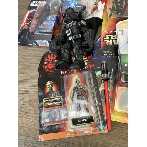 458 - A large collection of boxed and unboxed Star Wars figurines to include Saga Legends Darth Maul, The ... 