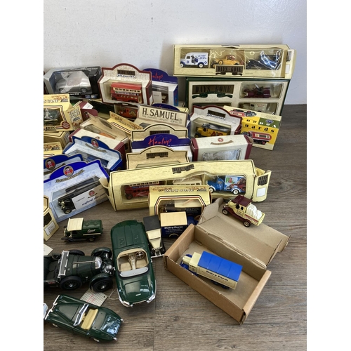 459 - A large collection of boxed diecast model vehicles to include Great British Buses London Transport R... 