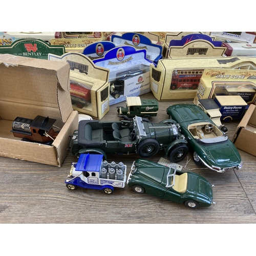 459 - A large collection of boxed diecast model vehicles to include Great British Buses London Transport R... 