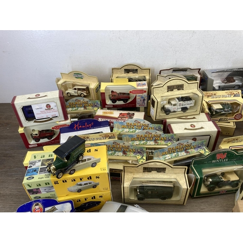 459 - A large collection of boxed diecast model vehicles to include Great British Buses London Transport R... 