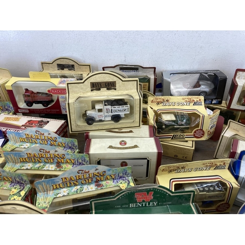 459 - A large collection of boxed diecast model vehicles to include Great British Buses London Transport R... 