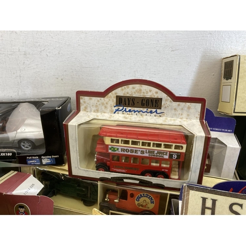 459 - A large collection of boxed diecast model vehicles to include Great British Buses London Transport R... 