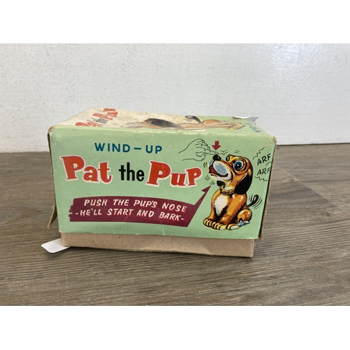 466 - A mid 20th century boxed Japanese T.P.S. Pat the Pup tinplate toy