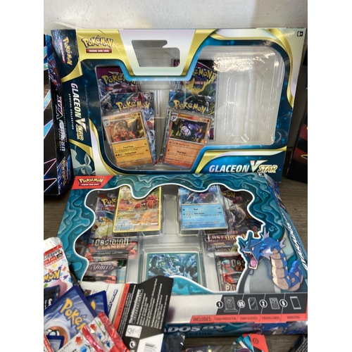 467 - A large collection of Pokémon cards and accessories to include Scarlet and Violet Paldean Fates Elit... 