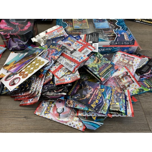 467 - A large collection of Pokémon cards and accessories to include Scarlet and Violet Paldean Fates Elit... 