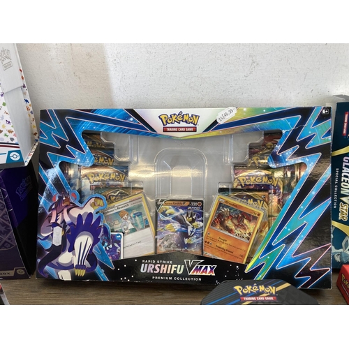 467 - A large collection of Pokémon cards and accessories to include Scarlet and Violet Paldean Fates Elit... 