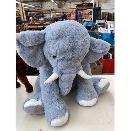 469 - Two large soft toys, one freestanding horse and one elephant