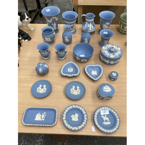 387 - Twenty two pieces of Wedgwood pale blue Jasperware