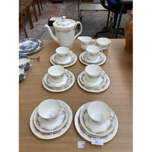 391 - A Minton Rhapsody twenty one piece tea set