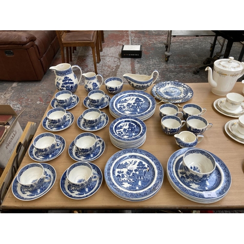 392 - A collection of Wedgwood Willow dinnerware to include twelve cups, eight saucers, milk jug, sugar bo... 