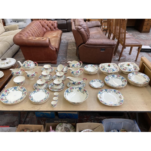 393 - A collection of Royal Cauldon Victoria dinnerware to include six cups, saucers and side plates, two ... 