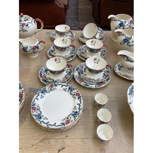 393 - A collection of Royal Cauldon Victoria dinnerware to include six cups, saucers and side plates, two ... 