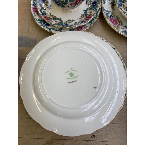 393 - A collection of Royal Cauldon Victoria dinnerware to include six cups, saucers and side plates, two ... 