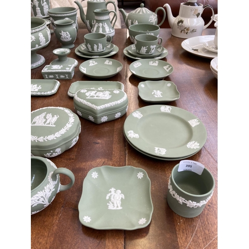 395 - A collection of Wedgwood sage green Jasperware to include teapot, coffee pot, circular pedestal bowl... 