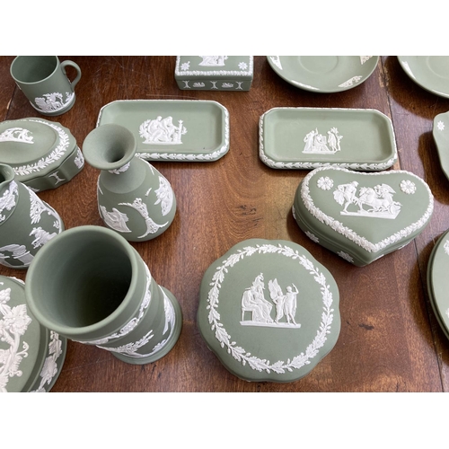 395 - A collection of Wedgwood sage green Jasperware to include teapot, coffee pot, circular pedestal bowl... 