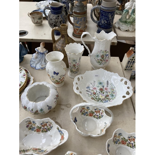 402 - A collection of ceramics to include two Royal Doulton figurines, Fragrance HN2334 and Marjorie HN278... 