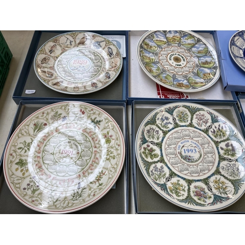 414 - Ten boxed Wedgwood collector's plates