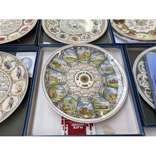 414 - Ten boxed Wedgwood collector's plates