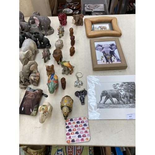 417 - A collection of elephant figurines, paperweights and decorative items to include boxed Objets D'Art ... 