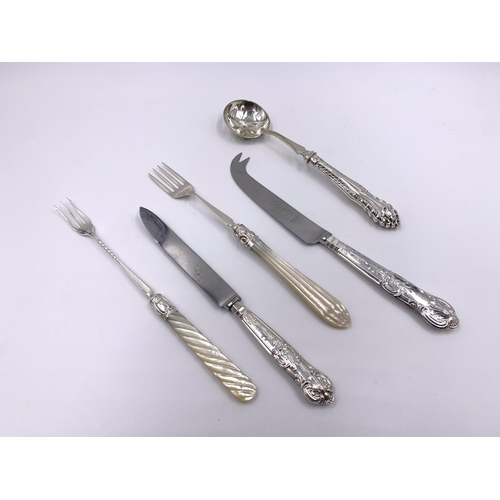 2123 - Five pieces of hallmarked silver cutlery, Sheffield silver handled cake fork - dated 1967, Sheffield... 