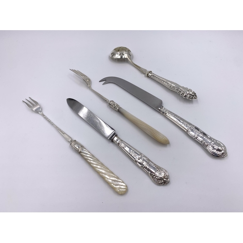 2123 - Five pieces of hallmarked silver cutlery, Sheffield silver handled cake fork - dated 1967, Sheffield... 