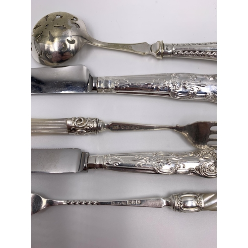 2123 - Five pieces of hallmarked silver cutlery, Sheffield silver handled cake fork - dated 1967, Sheffield... 