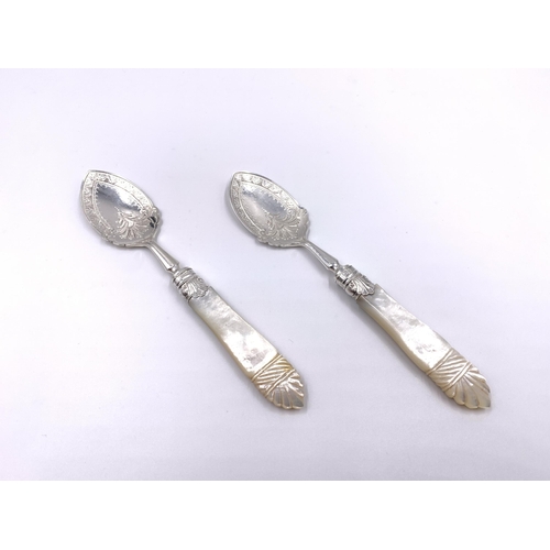 2124 - A pair of Victorian Arthur Priestley & Co hallmarked Sheffield silver and mother of pearl handled ja... 