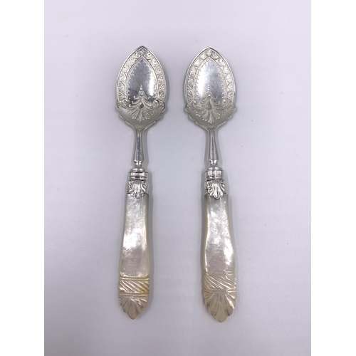 2124 - A pair of Victorian Arthur Priestley & Co hallmarked Sheffield silver and mother of pearl handled ja... 