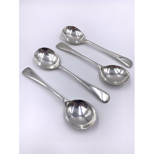 2126 - A set of four George V Walker & Hall hallmarked Sheffield silver soup spoons, dated 1929 - approx. g... 