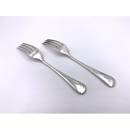 2127 - A pair of James Dixon & Sons Ltd hallmarked Sheffield silver dinner forks, dated 1944 - approx. gros... 