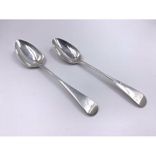 2132 - A pair of George III hallmarked London silver serving spoons, dated 1804 - approx. gross weight 138g... 