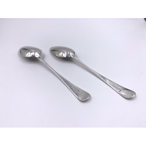 2132 - A pair of George III hallmarked London silver serving spoons, dated 1804 - approx. gross weight 138g... 