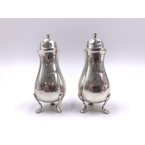 2135 - A pair of Edward VII James Deakin & Sons hallmarked Sheffield silver salt and pepper pots, dated 190... 