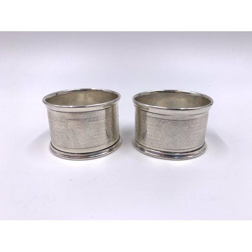 2138 - A pair of William Walter Cashmore hallmarked Birmingham silver napkin rings - approx. gross weight 3... 