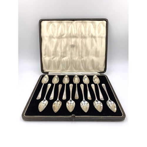 2142 - A cased set of twelve George VI William Bruford & Son Ltd hallmarked London silver grapefruit spoons... 