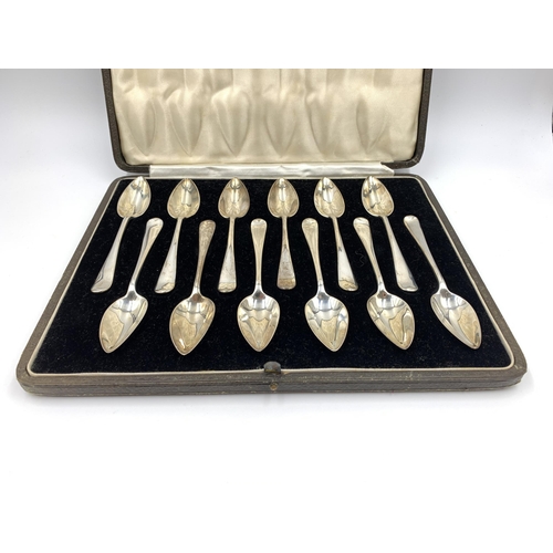 2142 - A cased set of twelve George VI William Bruford & Son Ltd hallmarked London silver grapefruit spoons... 