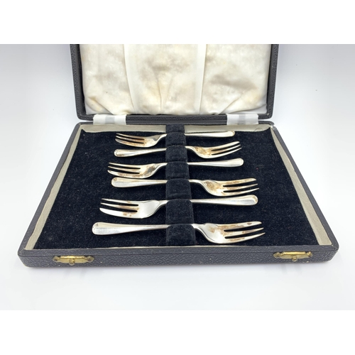 2143 - A cased set of six George VI Thomas Bradbury & Sons Ltd hallmarked Sheffield silver cake forks, date... 