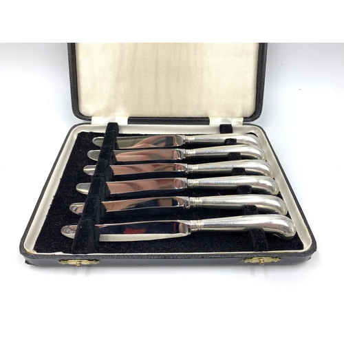 2146 - A cased set of six hallmarked Sheffield silver handled butter knives - approx. gross weight 154g