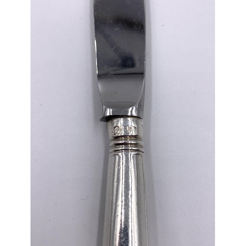 2146 - A cased set of six hallmarked Sheffield silver handled butter knives - approx. gross weight 154g