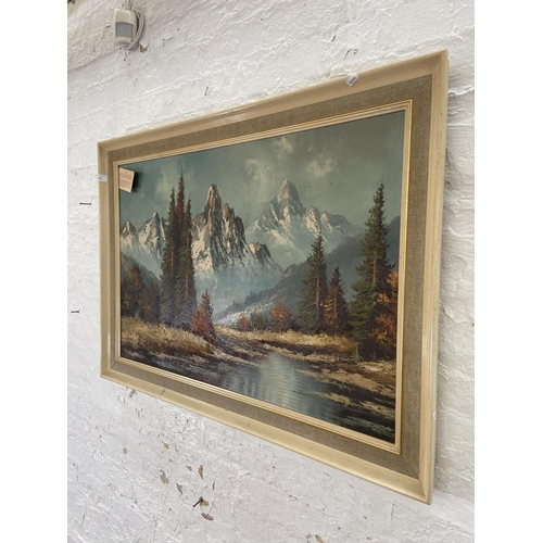 304 - A mid 20th century framed J. De Nooyer oil on canvas of a mountain lakeside scene - approx. 75cm hig... 