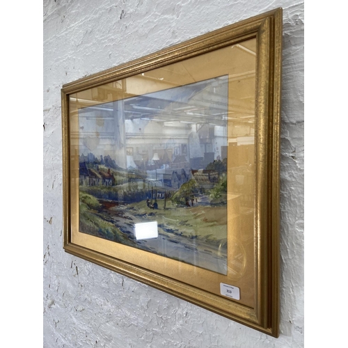 314 - A 20th century gilt framed watercolour of a landscape scene signed lower left - approx. 50cm high x ... 