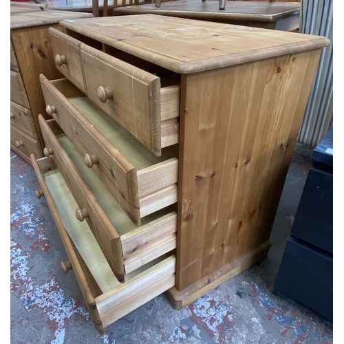 100 - A pine chest of drawers - approx. 74cm high x 84cm wide x 40cm deep