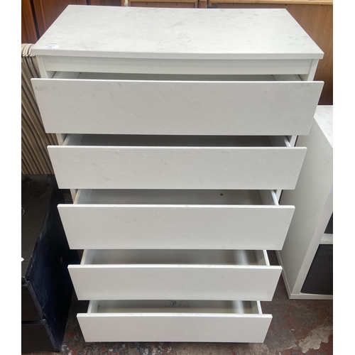 102 - An IKEA white laminate chest of drawers - approx. 113cm high x 70cm wide x 40cm deep